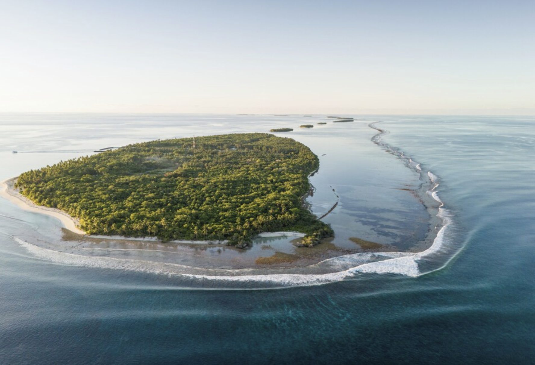 Aerial view of Kondey island surrounded by reef